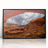 Large abstract wall art depicting Canyonlands with vibrant orange and red tones, framed in black acrylic.