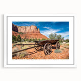 Abstract art print of Capitol Reef in Utah, featuring earthy red and orange tones on a white framed matte.