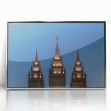 Mid-century modernist art depicting the Salt Lake City skyline in muted blue tones on a framed acrylic print.