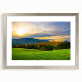 Textured art print depicting an abstract Vermont landscape in muted green and brown tones, framed in silver.