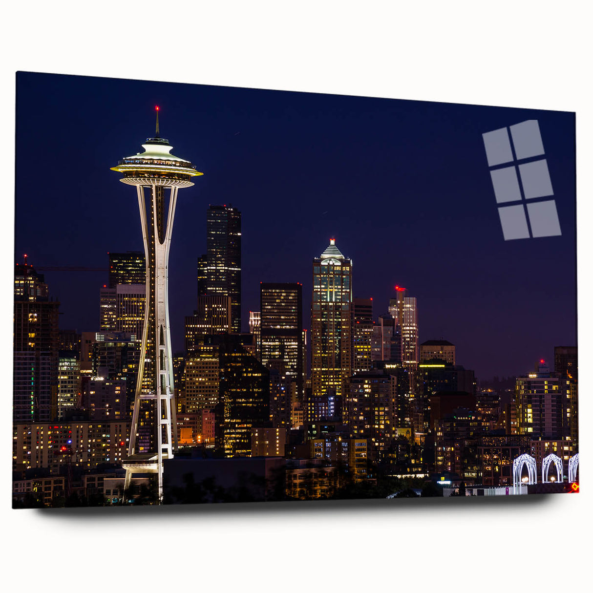 Large abstract depiction of Seattle skyline in muted blue and gray tones on acrylic glass.