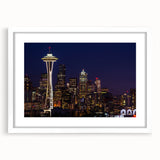 Abstract art print of Seattle skyline in muted gray and blue tones on a white framed canvas, suitable for dining room decor.