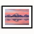 Abstract art print of Wyoming's Grand Tetons in vibrant, colorful hues on a large textured canvas, framed in black.