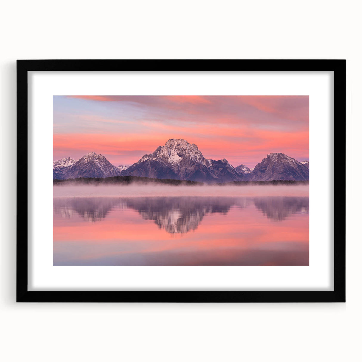 Abstract art print of Wyoming's Grand Tetons in vibrant, colorful hues on a large textured canvas, framed in black.