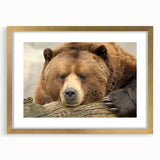 Extra large wall art depicting an abstract Yellowstone scenery in textured shades of gold and brown, framed with a gold mat.