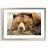 Textured abstract art print of Yellowstone scenery in muted earth tones, framed in silver, ideal for bedroom art.