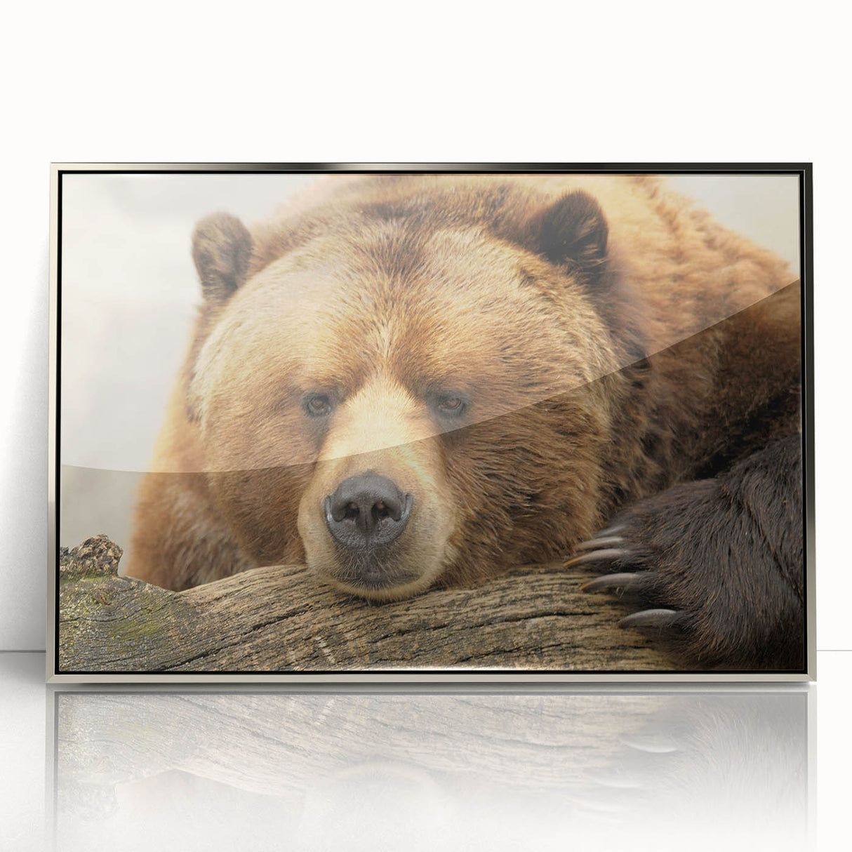 Mid-century modernist art depicting Yellowstone scenery in muted earth tones on a silver-framed acrylic print.