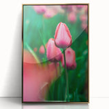 Large art print of a spring landscape in pastel shades on acrylic, framed in gold.
