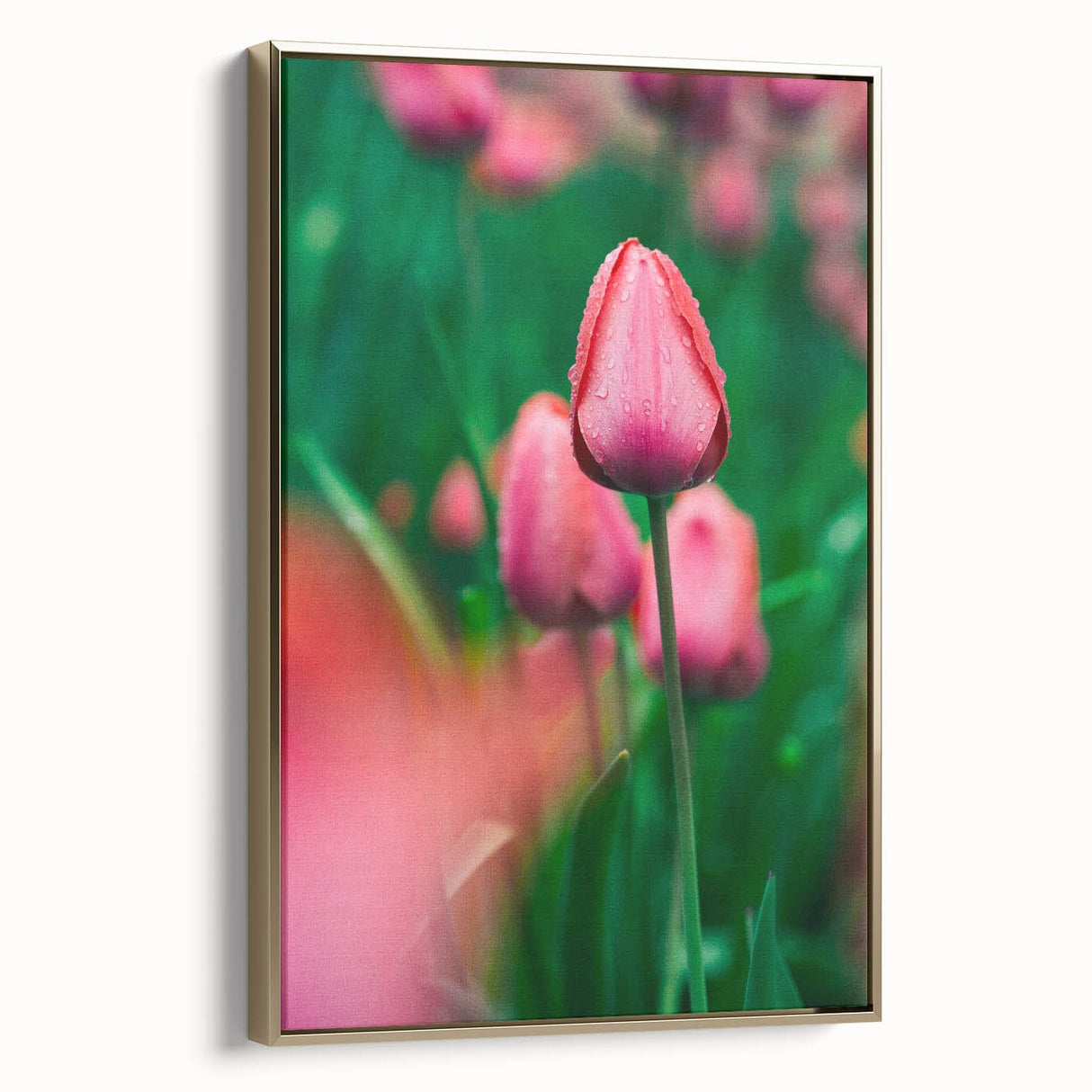Framed canvas of a vintage-style landscape painting featuring spring season with muted green and gold tones.
