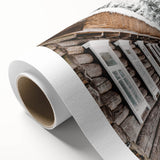 Art Deco poster of a snowy landscape on rolled canvas, featuring cool blue and white tones, ideal for nursery wall art.