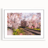 Abstract art print featuring assorted transportation motifs in muted colors on a white framed mat.