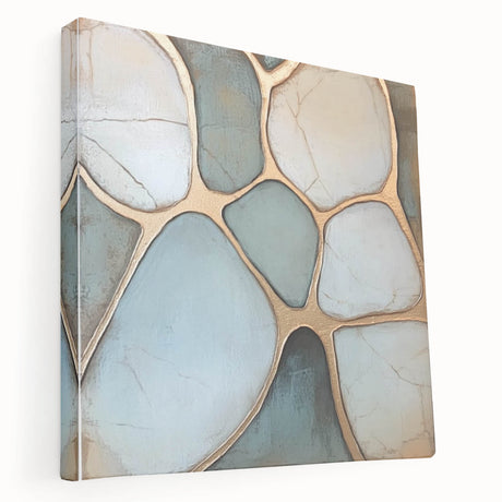 Abstract geometric stretched canvas artwork showcasing vibrant blue, orange, and yellow shapes, displayed in a side view to highlight its depth and texture, perfect for modern decor.