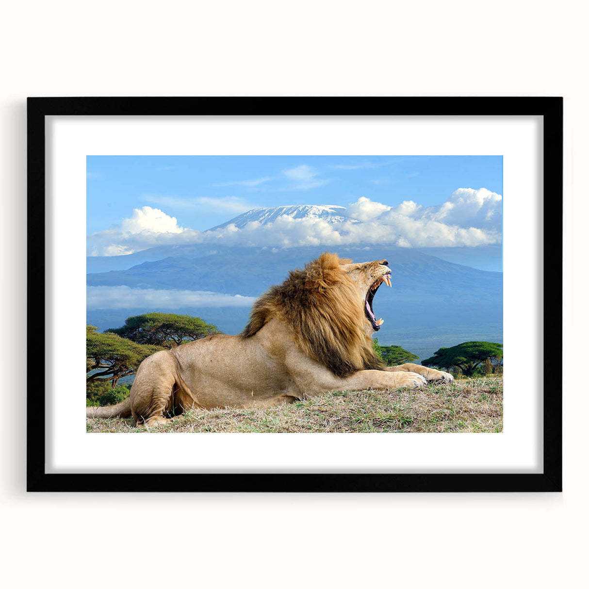Extra large colorful art print of abstract African scenery in vibrant hues, framed with a black mat.