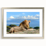 Abstract art print of African scenery in muted earth tones on a framed canvas, suitable for dining room decor.