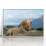 Acrylic print of a Kenyan landscape with vivid green tones and wildlife, framed in white.