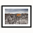 Extra large abstract art print of Madagascar scenery in vibrant colors on a textured canvas, framed in black.