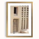 Textured abstract art print of a Mali scenery in gold frame, ideal for bedroom wall decor.