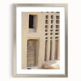 Abstract art print of African scenery in muted earth tones on a framed canvas, suitable for dining room decor.