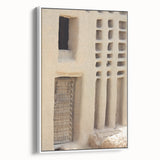 Framed canvas depicting a vintage-style Mali landscape in muted earth tones, ideal for bedroom wall art.