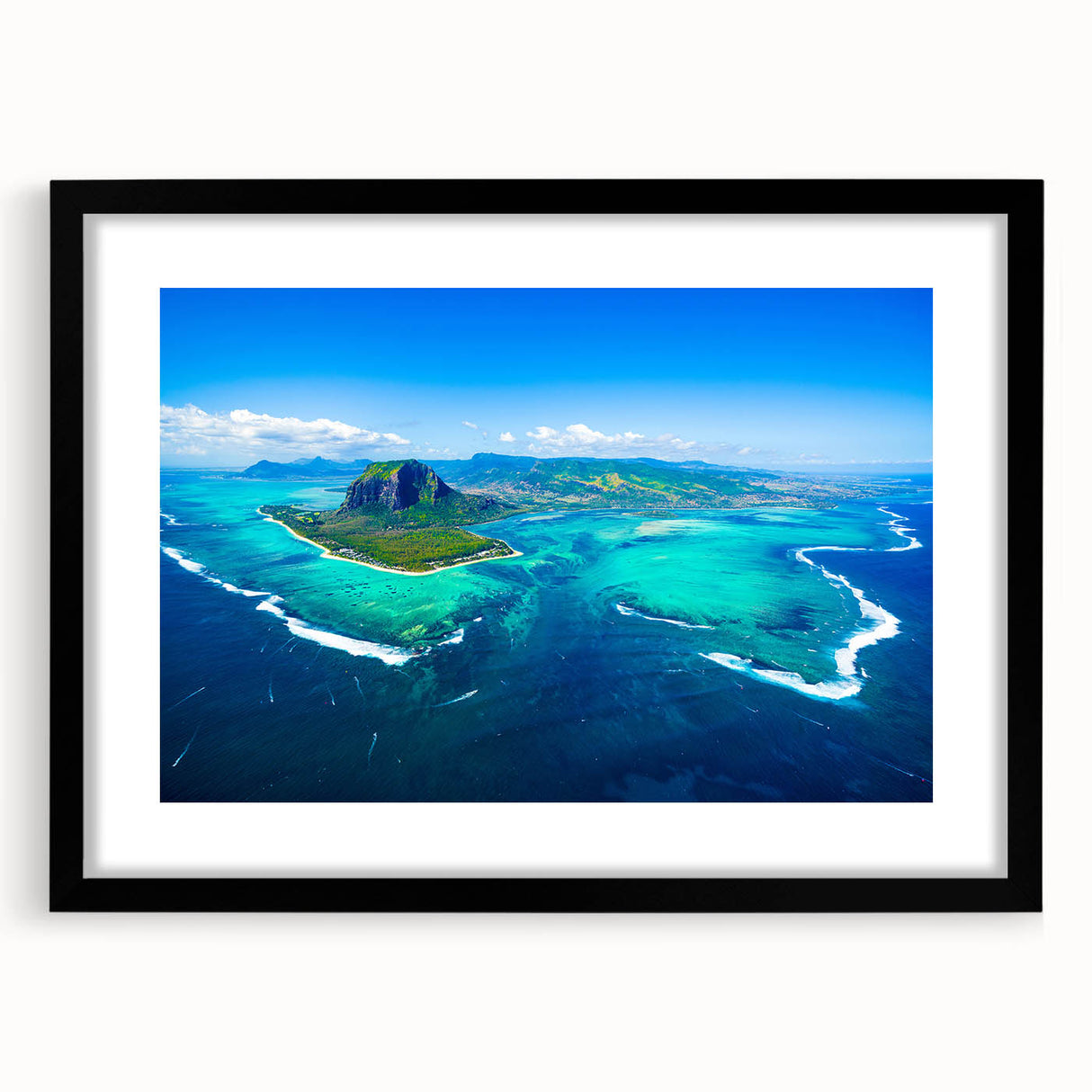 Colorful abstract art print of a textured African scenery in vibrant hues on a large framed canvas.