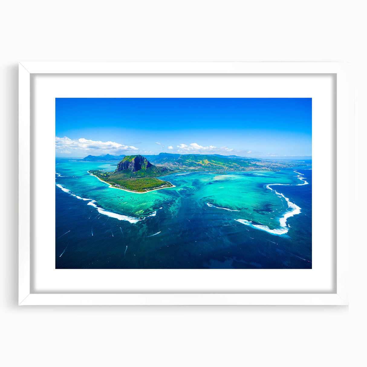 Extra large abstract art print of a textured African scenery in muted earth tones, framed in white.