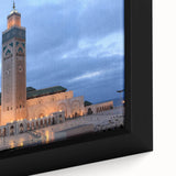 Framed canvas depicting a textured Moroccan landscape in vibrant colors on a black background.