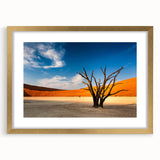 Textured art print of an abstract Namibian landscape in earth tones on a framed canvas, ideal for bedroom decor.