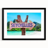 Extra large abstract art print depicting a vibrant, colorful Seychelles scenery on a textured canvas, framed in black.