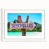 Textured abstract art print of Seychelles scenery in muted earth tones on a framed white mat, ideal for bedroom art.