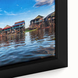 Black wall art featuring a textured, colorful Cambodian landscape on a framed canvas, ideal for living room decor.