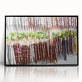 Large abstract wall art depicting a vibrant, colorful cityscape in mid-century modernist style, framed in black acrylic.
