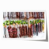 Rolled print of a Georgian landscape featuring lush greenery and floral elements in soft earth tones.