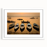 Abstract art print depicting a colorful Indian landscape in a white frame, suitable for dining room decor.