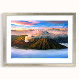 Textured abstract art print depicting a serene Indonesian landscape in muted earth tones, framed in silver.