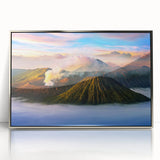 Mid-century modernist art depicting an Indonesian landscape in muted earth tones on a silver-framed acrylic print.