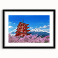 Extra large wall art featuring a colorful abstract depiction of Mount Fuji, in a black frame, ideal for living room decor.