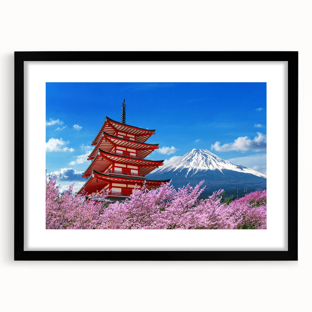Extra large wall art featuring a colorful abstract depiction of Mount Fuji, in a black frame, ideal for living room decor.