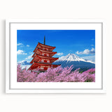 Abstract art print of Mount Fuji in muted blue tones, framed with a white mat, ideal for dining room decor.
