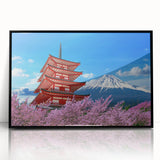 Large abstract wall art of Mount Fuji with muted blue and white tones, framed in black acrylic.