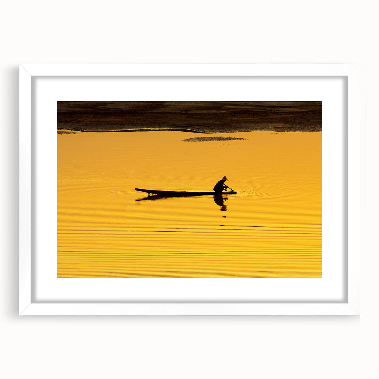 Abstract art print of a Laos scenery in muted earth tones on a framed white mat, suitable for dining room decor.