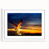 Abstract art print of a Malaysian landscape in muted earth tones on a framed white mat, suitable for dining room decor.