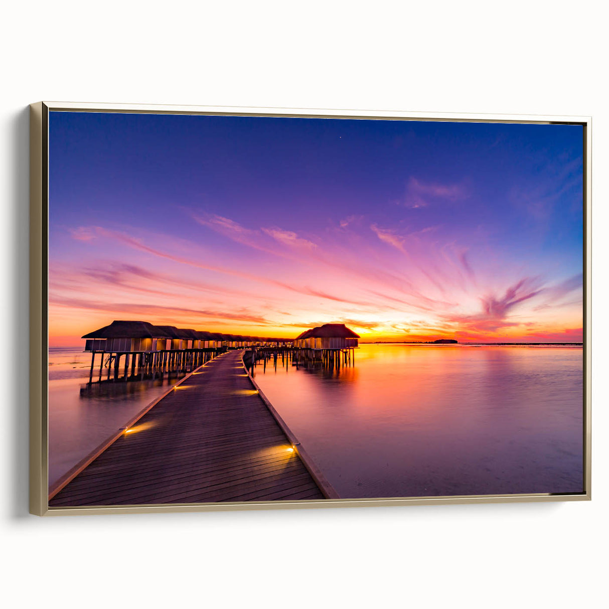 Framed canvas wall art featuring a serene Maldivian landscape with muted blues and greens, ideal for bedroom decor.