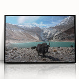 Large abstract wall art featuring a stylized Nepalese landscape in muted earth tones, framed in black acrylic.