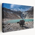 Landscape painting of the Himalayas on a large stretched canvas, featuring muted blue and white tones.