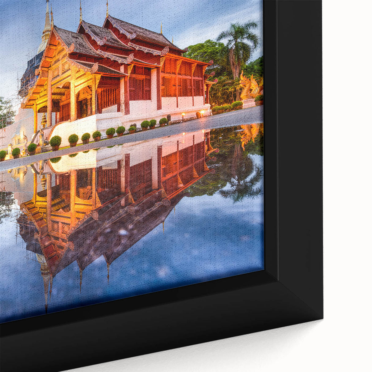 Extra large framed canvas of a textured black wall art featuring colorful, abstract scenery of Thailand.