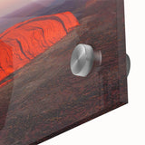 Large abstract depiction of Ayers Rock in muted earth tones on acrylic glass, suited for dining room art.