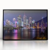 Large abstract wall art depicting the Brisbane skyline in muted gray and blue tones on a framed acrylic print.