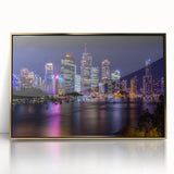 Framed acrylic print of Brisbane skyline in mid-century modernist style with gold accents, ideal for modern art wall decor.