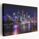 Side view of a large stretched canvas depicting the Brisbane skyline in muted blue and green tones.