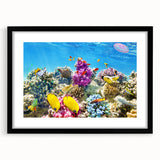 Extra large abstract art print depicting the Great Barrier Reef in vibrant, colorful textures on a framed canvas.